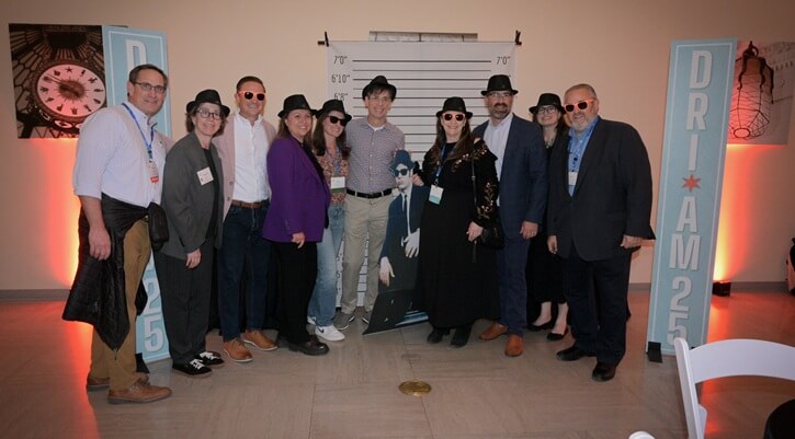Testimonial 1 Group photo at DRI 2025 Annual Meeting Blues Brothers theme