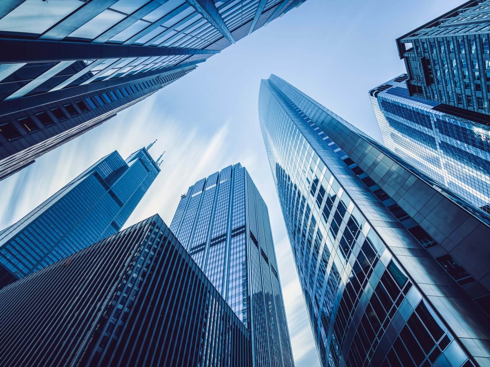 Upward view of downtown Chicago blue skies