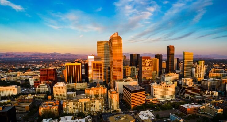 Denver skyline and mountains sunset